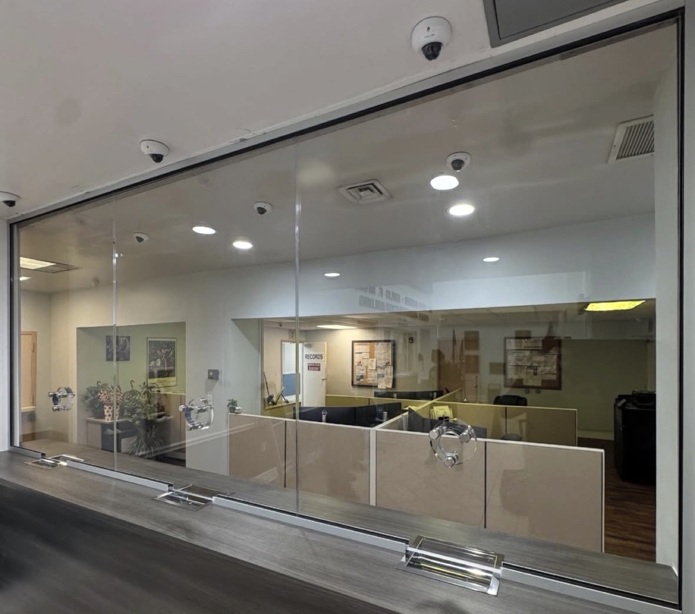 Secure interior glass replacement in a commercial building